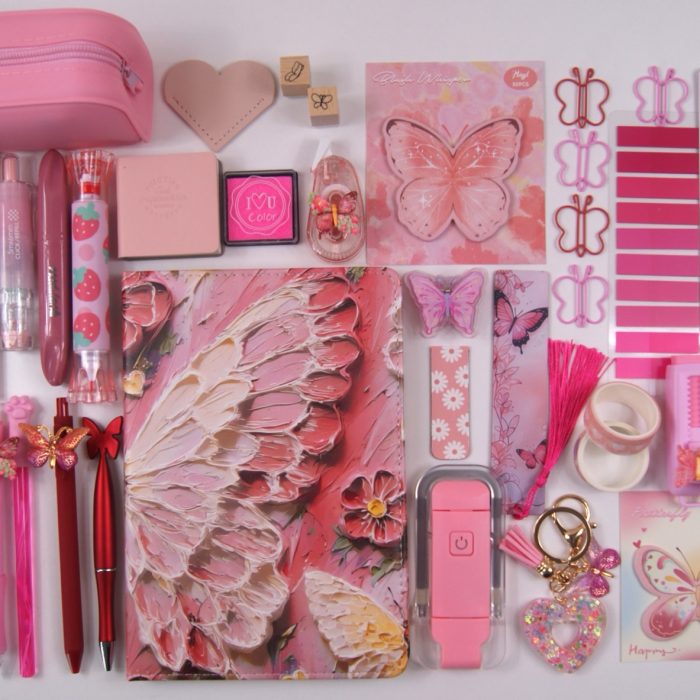 Ruby Red Butterfly stationery gift collection laid out to show the colour-coordinated contents