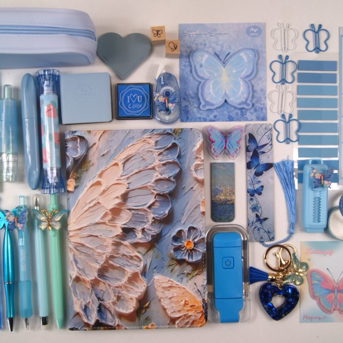 Sapphire Blue Butterfly stationery gift collection laid out to show the colour-coordinated contents