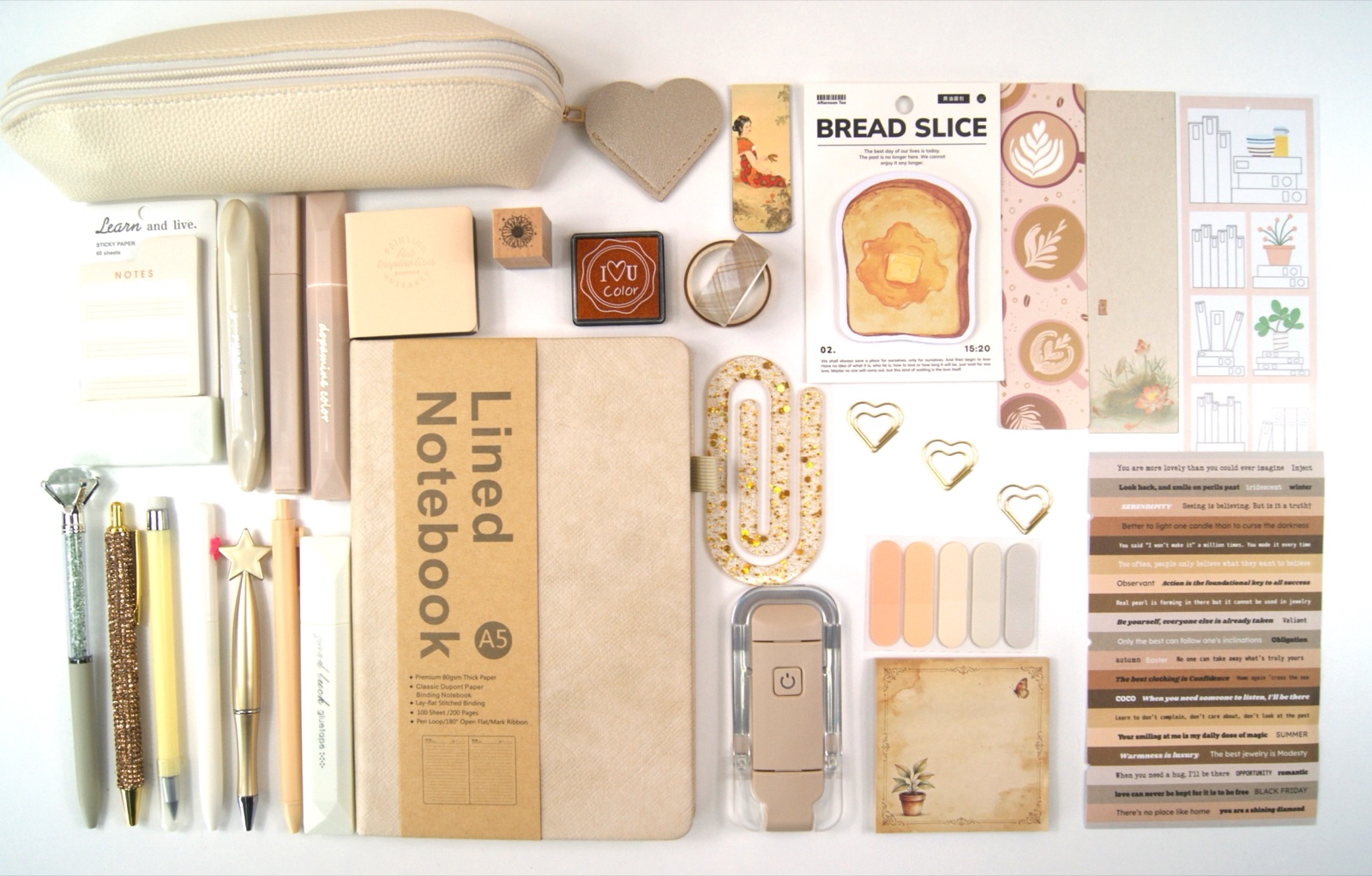 Signature Collection in Beige with the full colour-coordinated stationery set laid out on a pale background