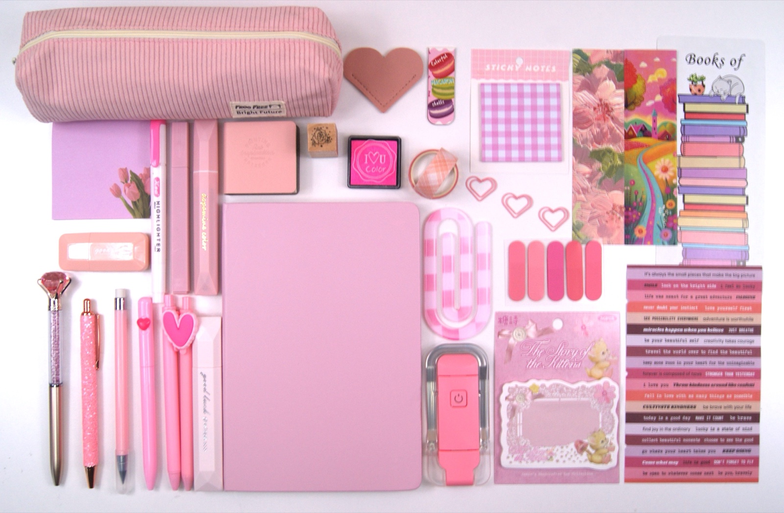 Signature Collection in Pink with the full colour-coordinated stationery set laid out on a pale background