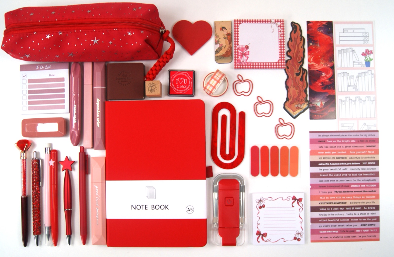 Signature Collection in Red with the full colour-coordinated stationery set laid out on a pale background