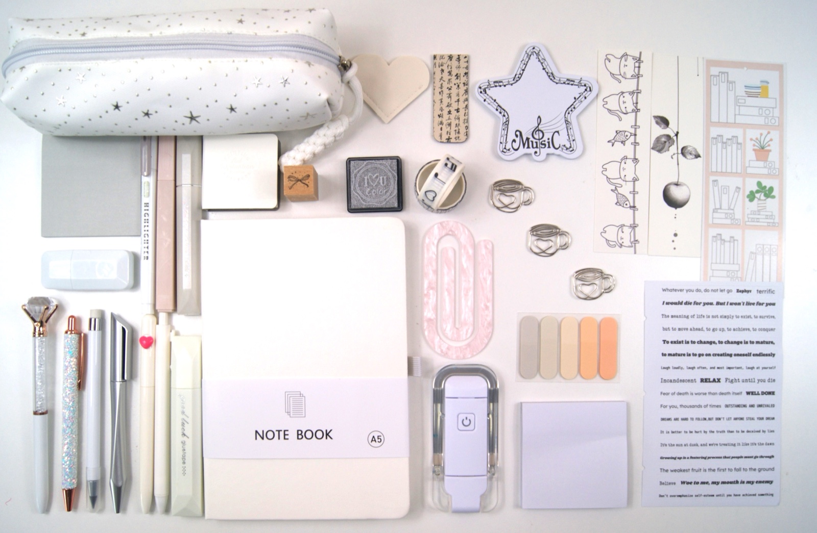 Signature Collection in White with the full colour-coordinated stationery set laid out on a pale background