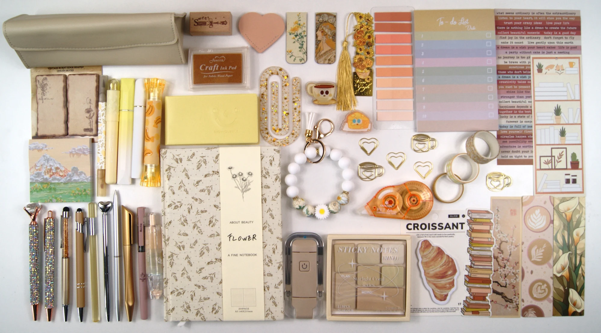 Indulgence Collection in Ivory & Espresso with colour-coordinated stationery arranged in a flat lay